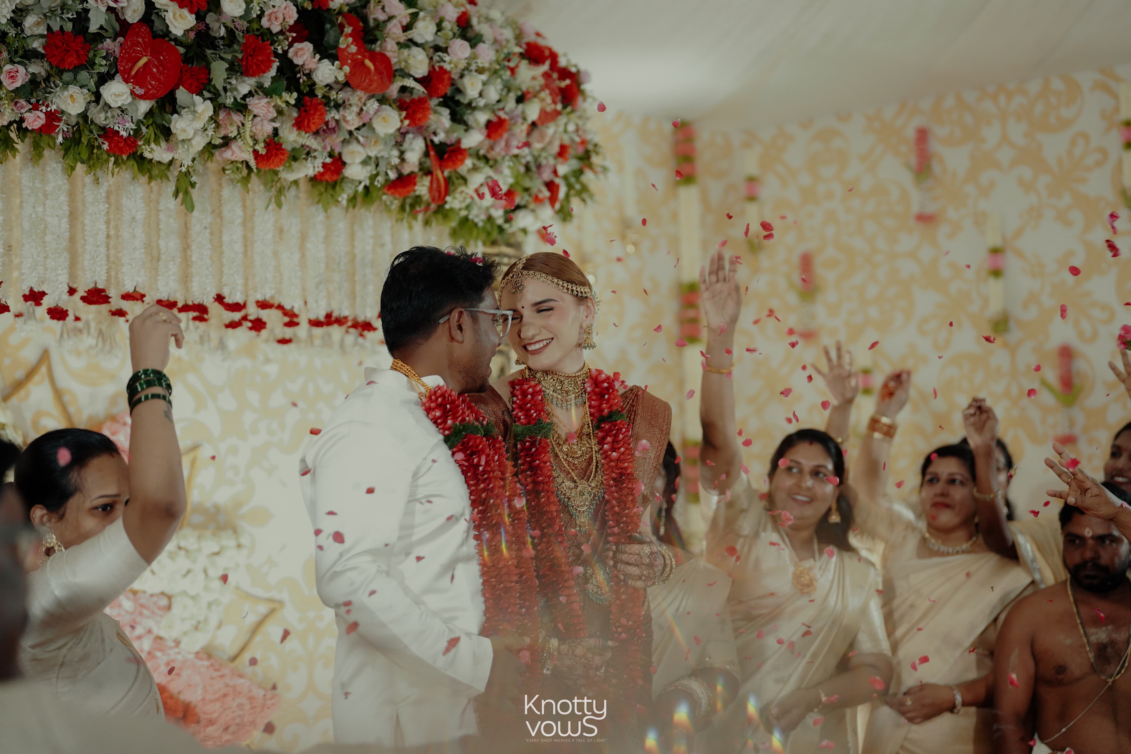 Destination wedding photography in Goa, India - a couple walking on the beach at sunset