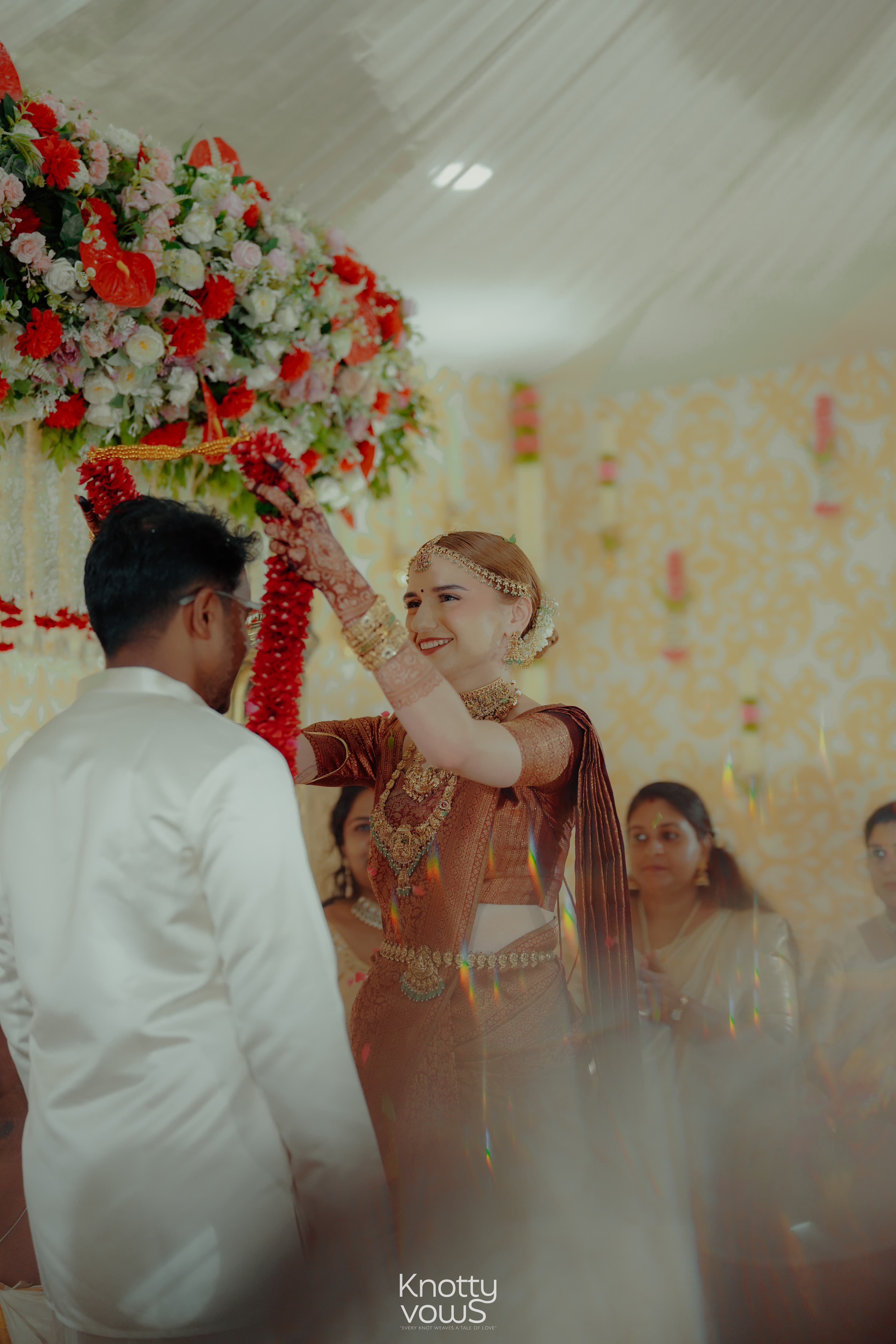Elegant Christian wedding reception photography from Trivandrum, capturing a couple's dance